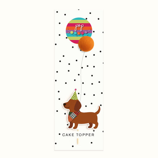 Perrito con globo